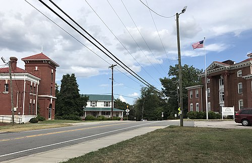 Center of Wentworth, with the former jail at left and the former county courthouse at right