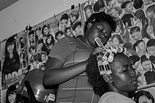 Hair rollers in Tanzania Women are in hair dress saloon.jpg