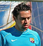 Xavi has made the most international competition appearances with 178 matches for Barcelona Xavi Hernandez - 002 (cropped).jpg