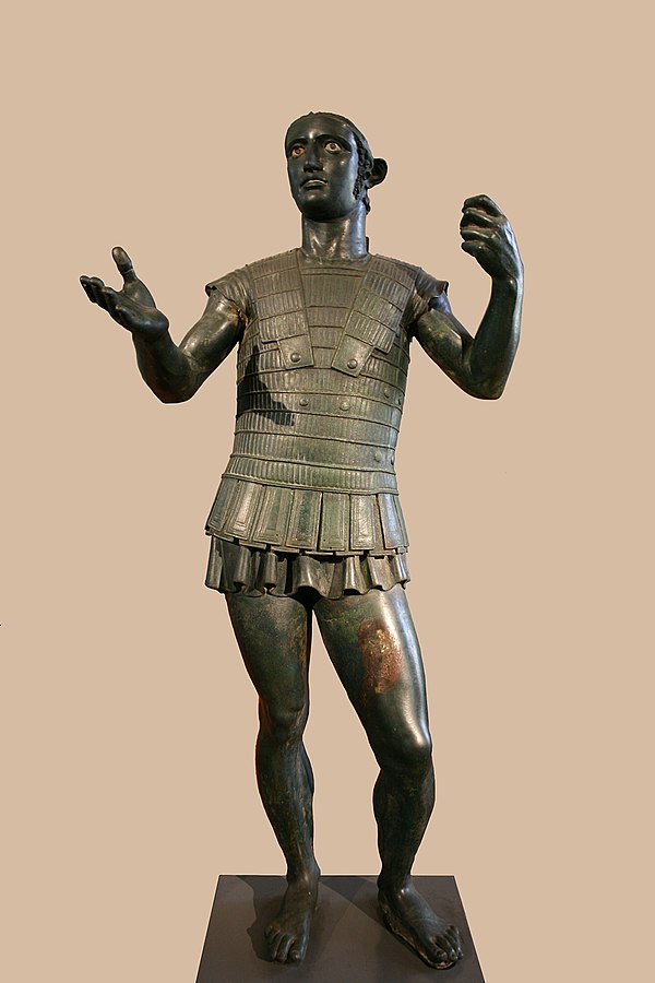 The Mars of Todi, a life-sized Etruscan bronze sculpture of a soldier making a votive offering, late 5th to early 5th century BC, kept in the Vatican 