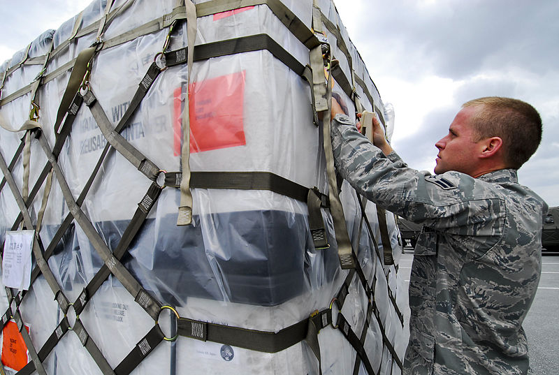 File:110316-F-LH638-078 prepares cargo full of supplies to Tohoku at Kadena.jpg