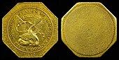 Deux pièces de monnaie octogonales, celle de gauche avec un aigle portant un serpent dans son bec et pas de dessin sur celle de droite.