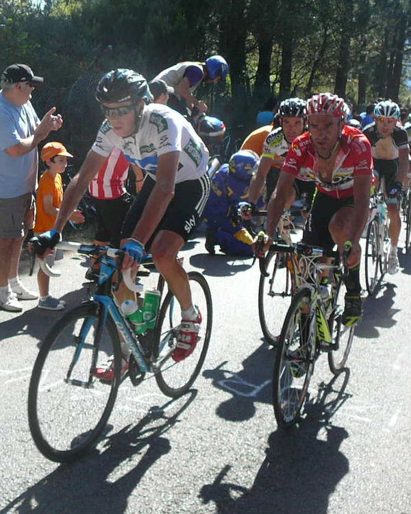 Team Sky's Chris Froome (left) at the 2011 Vuelta a España, where he finished second overall. At the time this was Sky's highest in a Grand Tour.