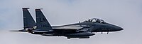 An F-15E Strike Eagle, tail number 01-2003, taking off from RAF Lakenheath in England. The aircraft is assigned to the 494th Fighter Squadron.