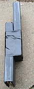 Two AR-15/M16/STANAG 30-round magazines placed together with duct tape.