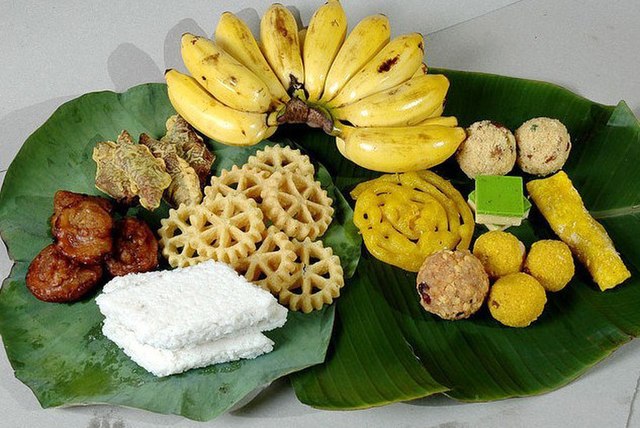 Avurudu festival sweetmeats including kavum, kokis, and kiribath (milk rice)