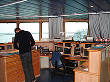 Navigation station on a ship Argonaute wheelhouse chart table.jpg