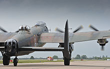 Avro Lancaster PA474 carrying 800,000 poppies, taking off from RAF Coningsby on 28 June 2012 for the opening ceremony BBMF Lancaster Bomber Preparing for Take Off MOD 45154145.jpg