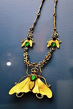 Necklace with brass insect decoration at the Museo de Arte Popular BrassFliesMAPDF.JPG