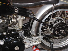 Rear suspension on a Vincent with shocks visible under the seat, introduced in late 1920s Cantilever motorcycle.jpg