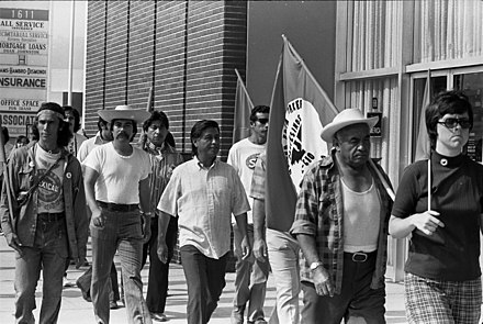 Cesar Chavez (center) on march from Mexican border to Sacramento with United Farm Workers members in Redondo Beach, California.