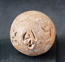 Cypro-Minoan clay ball in the Louvre.