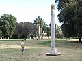 Column, fountain in the background