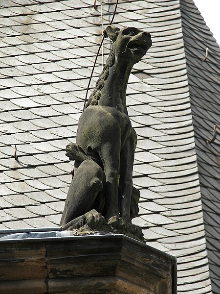 A figure depicting the term domini canes ('hounds of the lord') since the Inquisition in the 13th century, on a corner of a former Dominican monastery