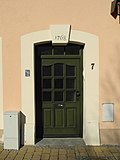 Sandstone door frame with keystone