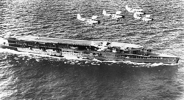 A flight of Baffins passing over HMS Furious, circa 1936