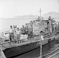 The German delegation, aboard a captured British motor launch, come alongside Kimberley to formally surrender