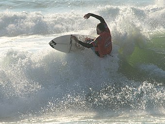 A surfer at Soorts-Hossegor, considered as one of the best surfing spots in the world.[126]