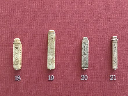 Ivory bankers' tallies used to seal bags of denarii that were checked for weight and purity of silver