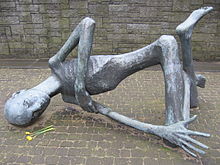 The sculpture ,,Der sterbende Haftling" (The Dying Prisoner) at the memorial site of the Neuengamme concentration camp. The camp operated from 1938 to 1945 in the Neuengamme neighbourhood of Hamburg. KZ Neuengamme Gedenk Skulptur.jpg