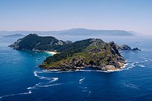 The Cíes Islands, part of the municipality of Vigo and the Atlantic Islands of Galicia National Park, partially obstruct the access from the Ria de Vigo to the open seas.