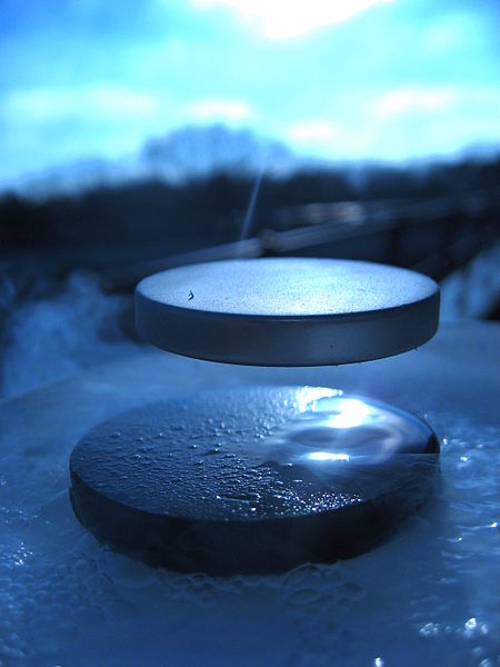 A superconductor levitating a permanent magnet