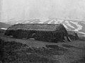 Long building built from earth and ground cover, Alaska, circa 1911-1913 (AL+CA 7155).jpg