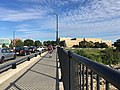 English: A long line of students walking across the Howe Bridge from East Campus to North Campus at UMass Lowell