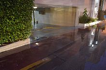 A partially below ground carpark in Miami Beach floods during the king tide season on October 12, 2016. Miami Beach massive garage flooding 1.jpg
