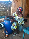 Миниатюра для Файл:Millet beer (chapalo) seller.jpg