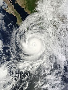 A photograph of a powerful hurricane and a tropical depression near each other off the Pacific coast of Mexico