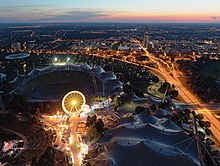 Light trails Olympiastadion at dusk.JPG