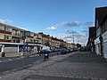 Shops on Queensway, west of the railway