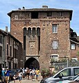 * Nomination Villars gate in Châtillon-sur-Chalaronne, France. --Chabe01 00:17, 15 July 2023 (UTC) * Decline The cars in the picture seem a bit distracting to the image. --Relativity 04:38, 15 July 2023 (UTC) For me it is more than just a bit disturbing, also bad bottom crop with cut legs. IMO it was not the right moment to take this photo --Michielverbeek 07:00, 15 July 2023 (UTC)