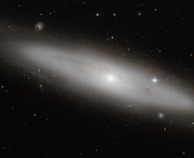 NGC 4866 is a lenticular galaxy located in the constellation of Virgo. Potw1328a.tif