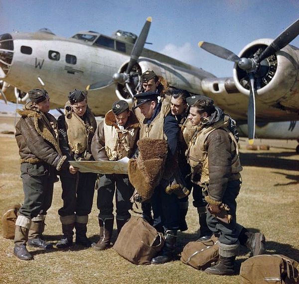 RAF Coastal Command crew holding a final conference before taking off in their Boeing B-17, from Lajes Field on Terceira Island in the Azores, 1943