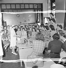 Schoolgirls in Britain being shown how to make a poultice, 1942 Schoolgirl Into Nurse- Medical Training in Britain, 1942 D8770.jpg