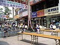 Traditional Korean music played through the streets of Songtan