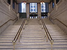 One of the two grand staircases, where movie scenes such as The Untouchables were filmed Stairs leading out of main hall, Chicago Union Station.jpg