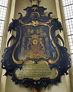 Een van de vele rijkversierde rouwborden in de kerk. Dit rouwbord werd gemaakt ter ere van Petronella Lewe (1684-1761)