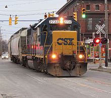 A CSX train sharing Schuyler Street in West Utica