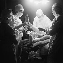 Army surgeons carry out an operation during the Second World War The British Army in Normandy 1944 B5802.jpg