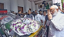 Prime Minister Narendra Modi paying tribute to Karunanidhi in Rajaji Hall The Prime Minister, Shri Narendra Modi pays tributes at the mortal remains of Kalaignar Karunanidhi, in Chennai on August 08, 2018.JPG