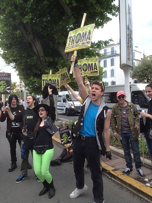 Protesters outside the 2013 Cannes Film Festival, demanding an award for Troma