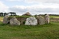 Dansk: Runddyssen på Tustrup-gravpladsen (Norddjurs Kommune). English: Restored dolmen at Tustrup Burial Ground in Norddjurs Kommune. Deutsch: Restaurierter Runddolmen auf dem steinzeitlichen Grabplatz bei Tustrup (Norddjurs Kommune). This is a photo of an archaeological site or monument in Denmark, number 47885 in the Heritage Agency of Denmark database for Sites and Monuments.