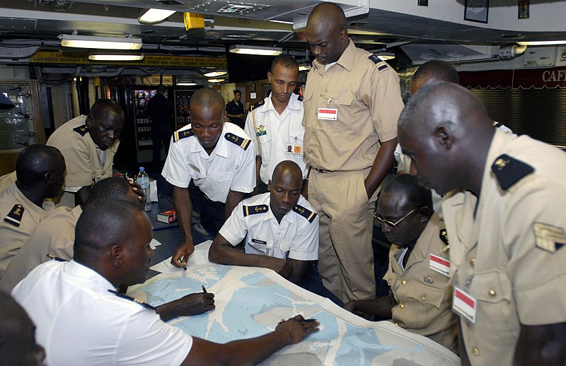 File:US Navy 090422-N-7948C-283 Gabon navy members discuss ship's navigation and charting techniques aboard the amphibious transport dock ship USS Nashville (LPD 13) during an Africa Partnership Station port visit to Port Gentil.jpg