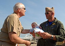 US Navy 090729-N-9116H-034 Rear Adm. Richard O'Hanlon, commander, Naval Air Force Altantic, greets Cmdr. Jake Ellzey, commanding officer of Strike Fighter Squadron (VFA) 143, during a homecoming celebration at Naval Air Station.jpg
