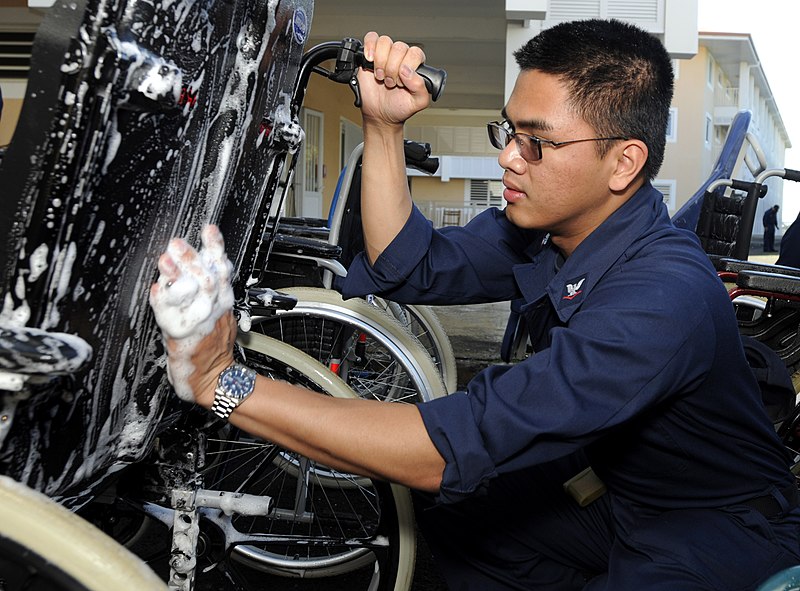 File:US Navy 110705-N-XG305-404 Hospital Corspman 3rd Class Paul Amores, assigned to the U.S. 7th Fleet command ship USS Blue Ridge (LCC 19), cleans a w.jpg