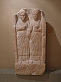 Gallo-Roman tombstone showing a couple holding hands. Found in Horbourg