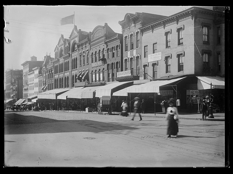 File:View of various stores and shops on 7th Street, N.W., West side, looking South from E Street LCCN2016646096.jpg